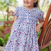little english classic childrens clothing girls purple blue and red floral dress with smocking at chest and ruffled collar