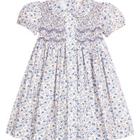 Little English traditional children's clothing. Capped sleeve blue, brown, and cream floral smocked dress with peter pan collar for little girls.