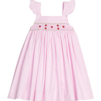 Little English traditional children's clothing.  Light pink seersucker gingham dress for little girls with flutter sleeves and strawberry smocking across the chest