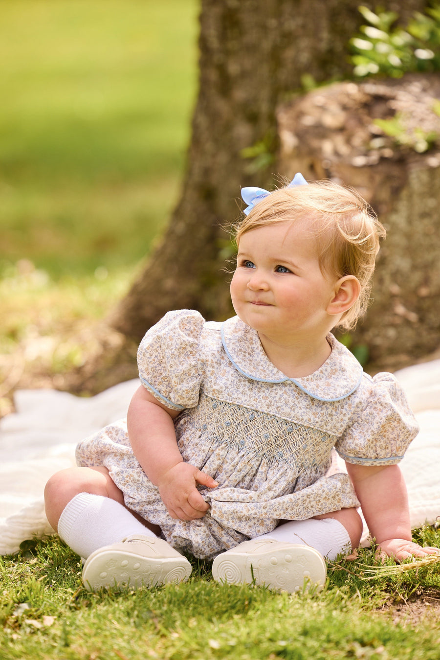 little english classic children's clothing baby light blue, cream, and light tan floral bubble for girl with peter pan collar, chest smocking, and embroidery, for fall 