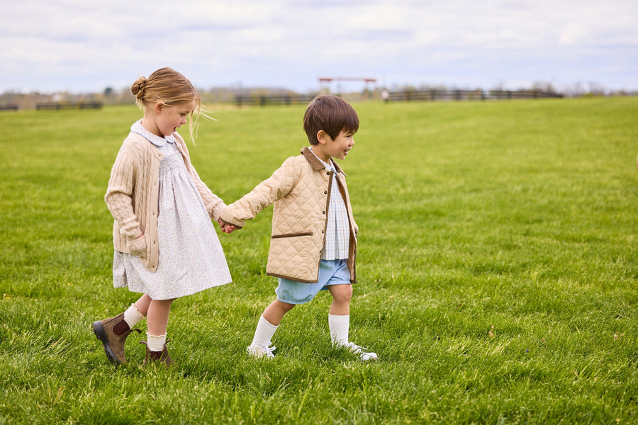 Little english classic childrens clothing, short set for boys in light blue and brown winthrop plaid with light blue corduroy shorts, Classic quilted jacket in khaki, Peter pan dress in winthrop floral print with smocking on chest, cashmere blend sweater in oatmeal, coordinating sibling outfits for fall 