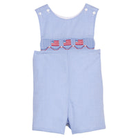 Little English traditional children's clothing.  Classic john john for toddler boys in royal blue mini gingham with American flag smocking at the chest