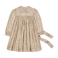 Little English traditional children's clothing. Long sleeve peter pan dress in tan Camden Floral with smocking across the chest for little girls.