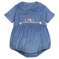 Little English classic children's clothing.  Baby boys stormy blue corduroy peter pan bubble with button tabs and flying mallard smocking across the chest.