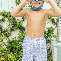 Little English traditional children's clothing. Blue swim trunks with alligator print for little boys for summer