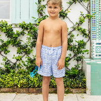 Little English traditional children's clothing. Blue swim trunks with alligator print for little boys for summer