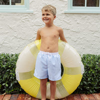 Little English traditional children's clothing. Blue swim trunks for little boys for summer