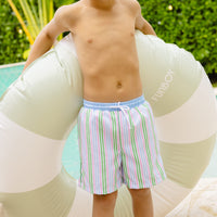 Little English traditional children's clothing. Blue, pink, and green striped swim trunks for little boys for summer