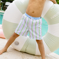 Little English traditional children's clothing. Blue, pink, and green striped swim trunks for little boys for summer