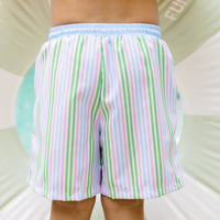 Little English traditional children's clothing. Blue, pink, and green striped swim trunks for little boys for summer