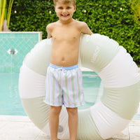 Little English traditional children's clothing. Blue, pink, and green striped swim trunks for little boys for summer