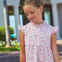Little English traditional children’s clothing, girl's pink floral tiered dress for Spring with ruffles at the collar and sleeves