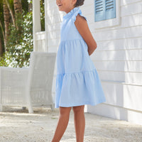 Little English traditional children’s clothing, girl's light blue tiered dress for Spring with ruffles at the collar and sleeves