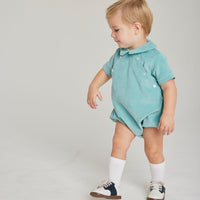 Little English baby boy classic canton corduroy woven bubble with clear buttons on both sides of front 