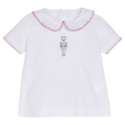 Little English baby boy's classic whipstitch top with nutcracker shadow embroidery for the holidays