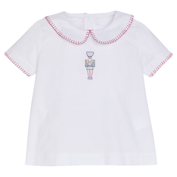 Little English baby boy's classic whipstitch top with nutcracker shadow embroidery for the holidays