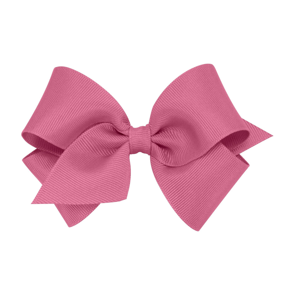 small little girls hairbow in a deep pinky rose color 