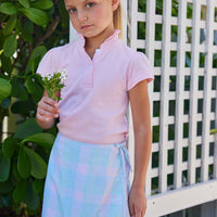 Little English girl's light pink knit short sleeve polo top with ruffle details