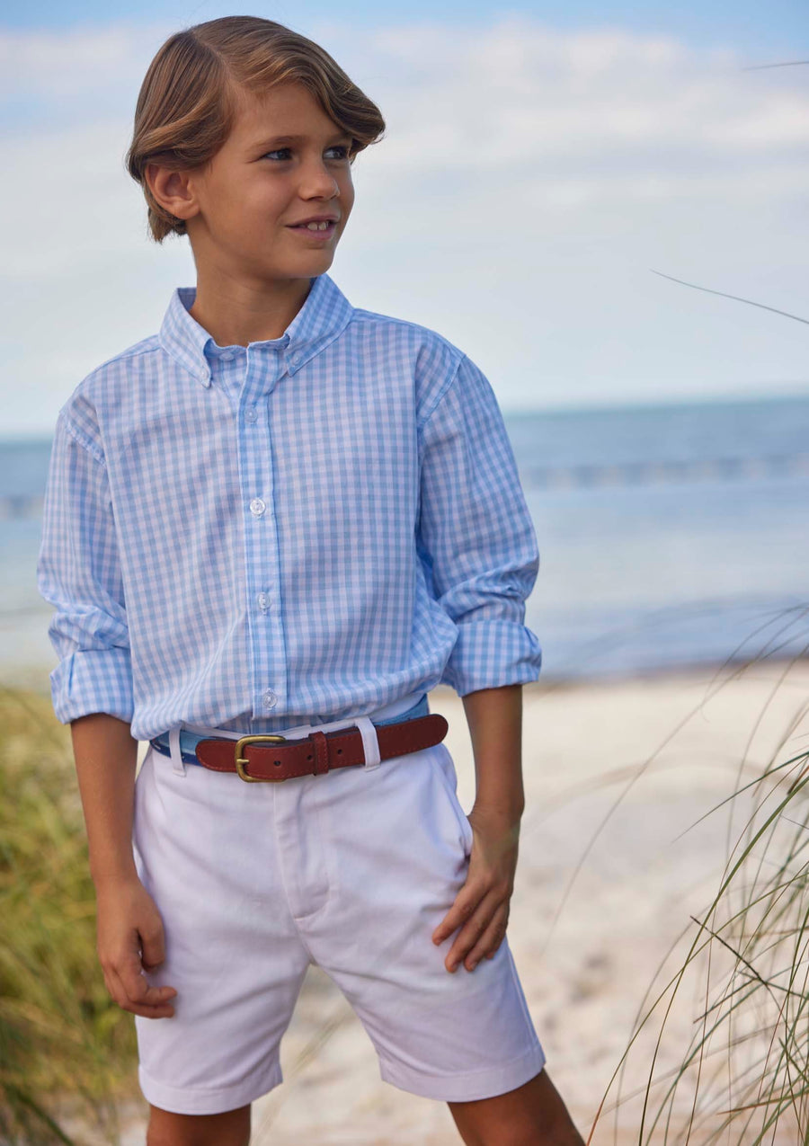 Little English tween boy light blue plaid button down with pearl colored buttons