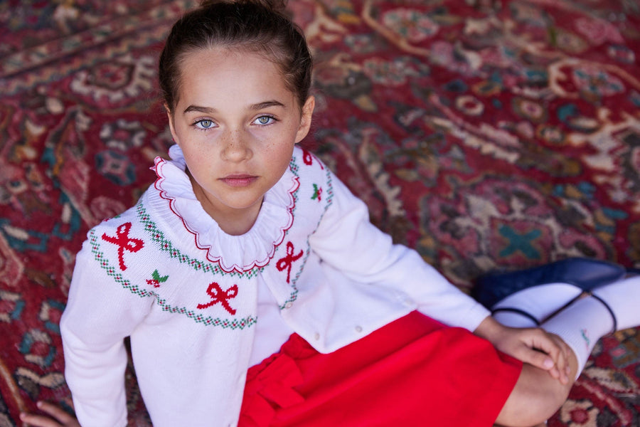 classic childrens clothing girls skirt with elastic waist and bow on the side in red corduroy