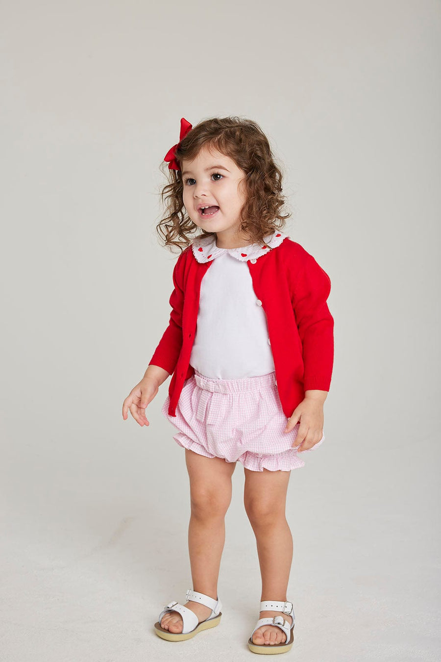 Little English girl's embroidered top with hearts for Valentine's Day