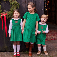 preppy baby boy clothes evergreen corduroy john john with red piping on button tabs on the side and button closures at shoulder