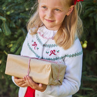 Little English girl's holiday sweater and red knit blouse, classic girl's clothing for fall