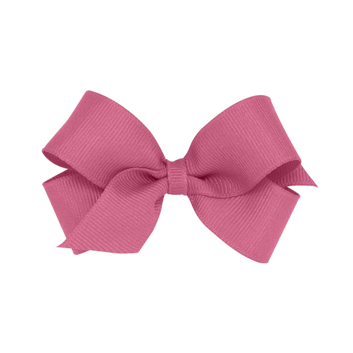 mini classic little girls hair bow in deep rose color 