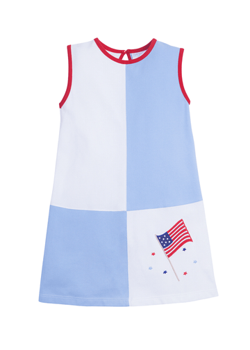 classic childrens clothes girls blue and white dress with red trim and american flag emblem