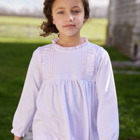 classic childrens clothing girls blouse with ruffle collar and sleeves and pink thread detail