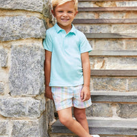 Short sleeve solid polo in aqua with basic shorts in derby plaid 