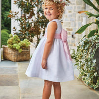 Little English traditional special occasion dress in white with light pink bow sash 
